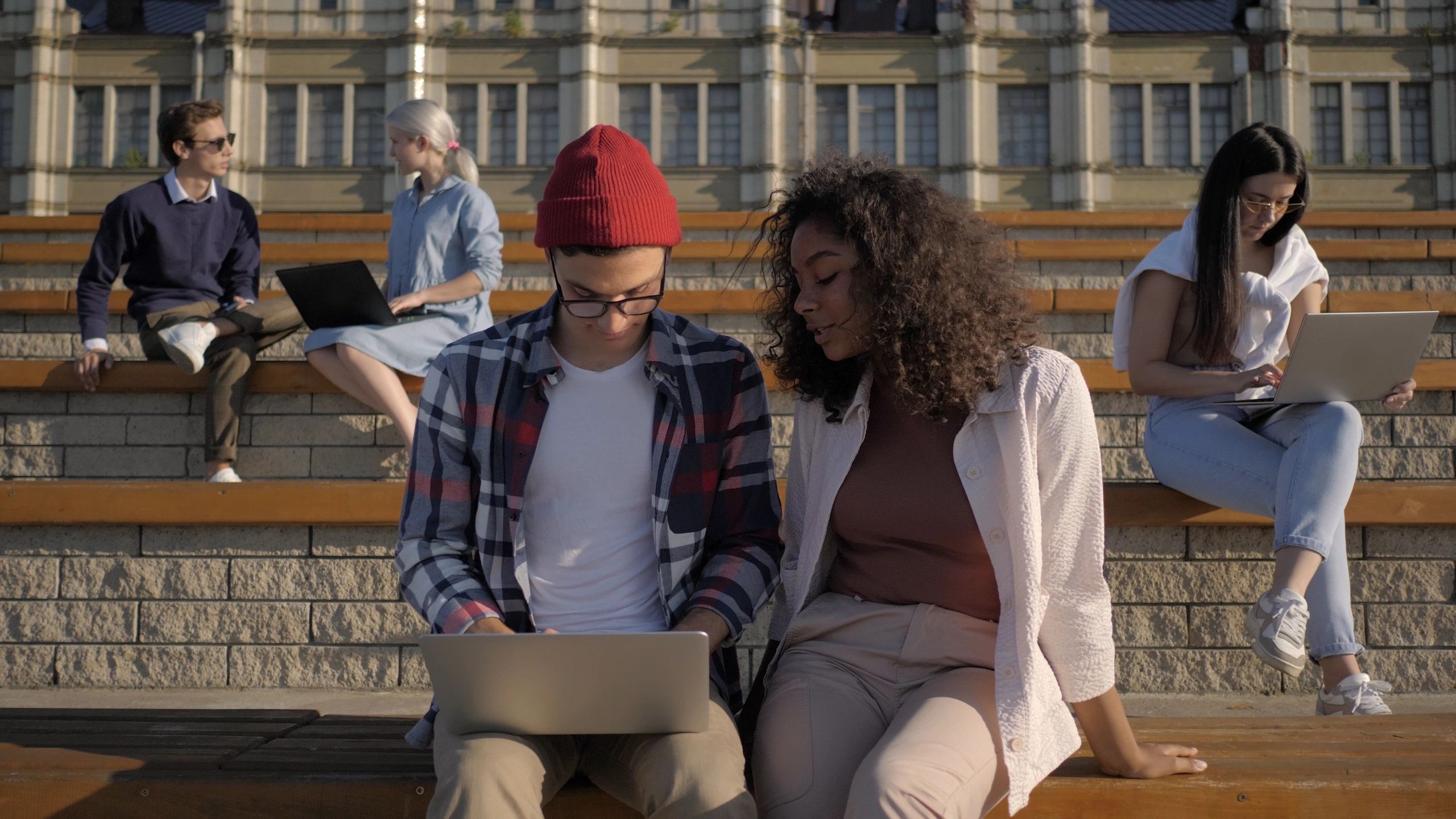 Students using laptops for study work
