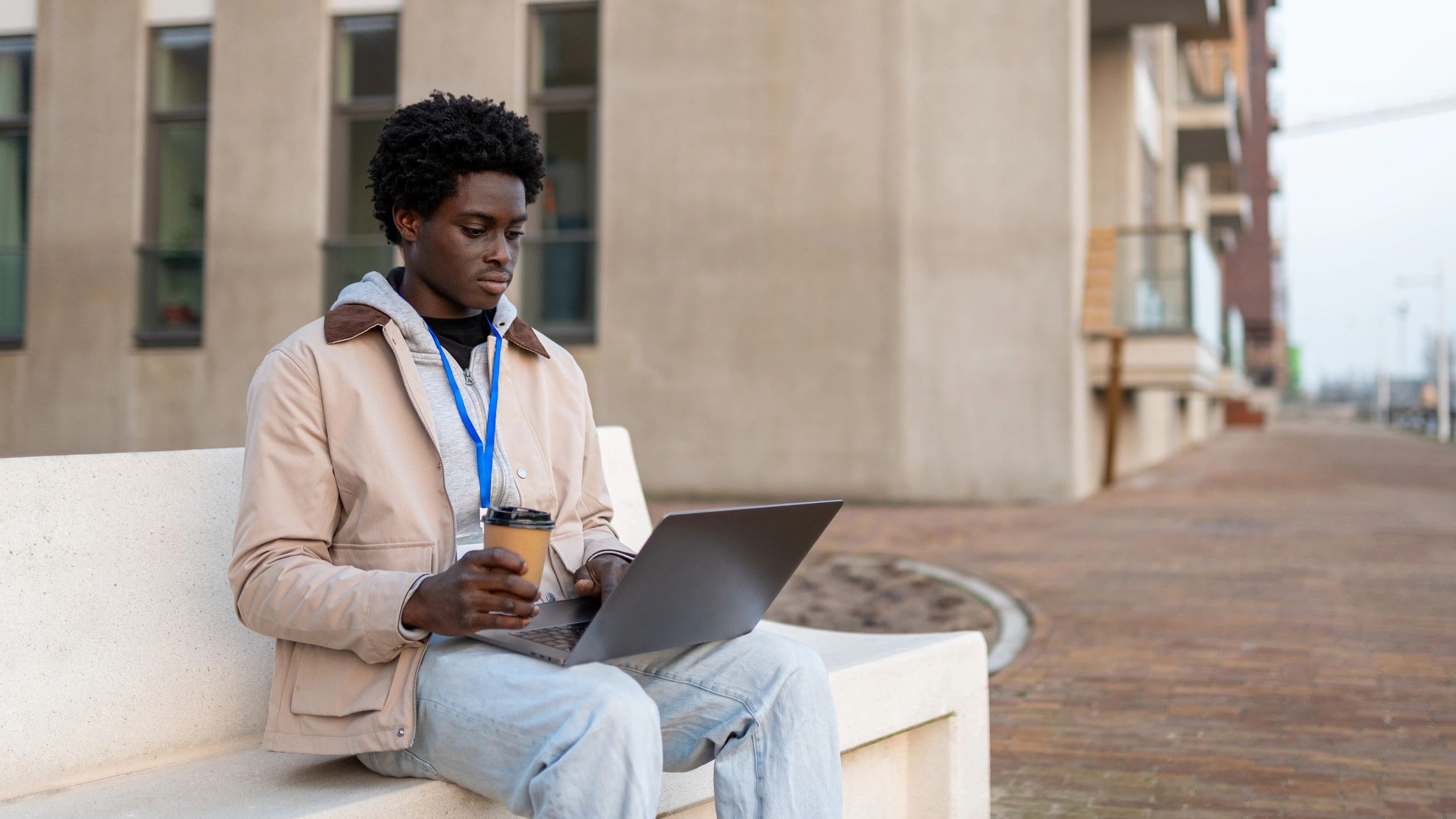 Student studying on a laptop for exam preparation